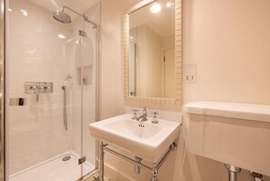 Combined shower/tub, hair dryer