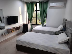 Exclusive Twin Room | Iron/ironing board, free WiFi - Sultan Executive Hotel (Faisalabad)