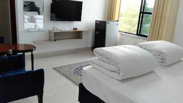 Habitación exclusiva con 2 camas individuales | Tabla de planchar con plancha y wifi gratis