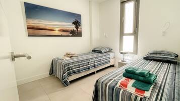 2 dormitorios, tabla de planchar con plancha, wifi gratis y ropa de cama