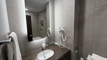 Combined shower/tub, hair dryer, bathrobes, slippers