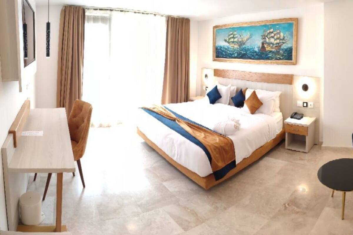 Kamar Double Superior, 1 Tempat Tidur King, Bebas Asap Rokok, pemandangan pantai | Seprai katun Mesir, seprai premium, minibar, dan Wi-Fi gratis
