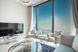 พรีเมียมอพาร์ทเมนท์ | บริเวณนั่งเล่น | สมาร์ททีวี 55 นิ้ว พร้อมช่องเคเ�บิล, ทีวี