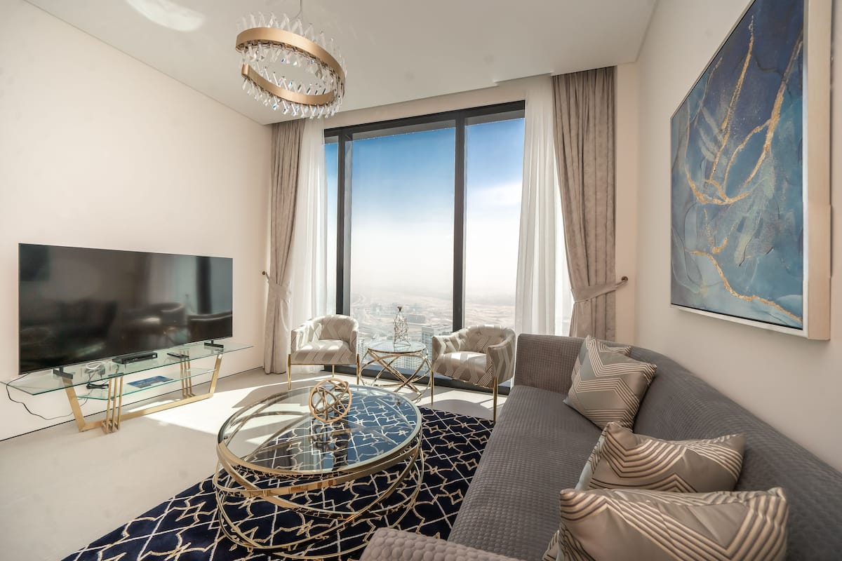 Premium Apartment | Living area | 55-inch Smart TV with cable channels, TV
