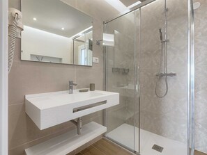 Bathtub, hair dryer, towels