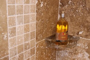 Shower, hair dryer, towels, toilet paper