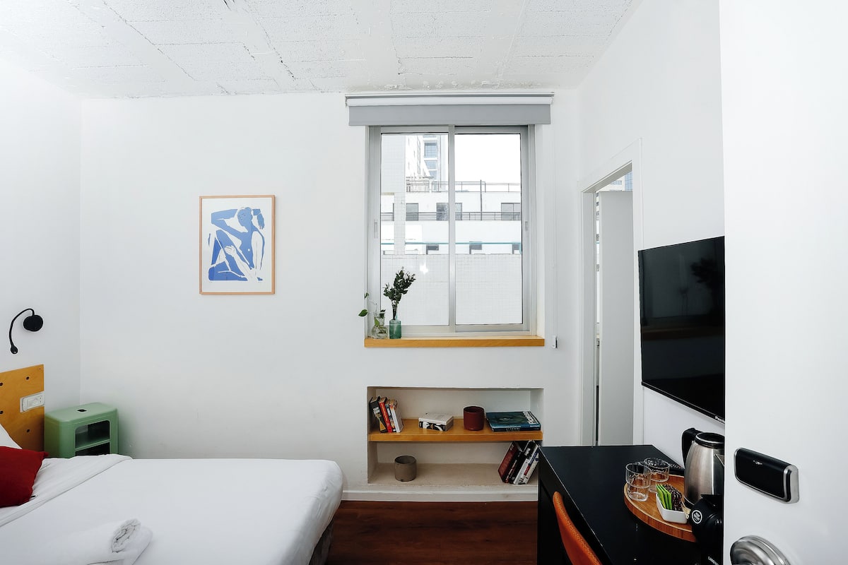 Economy Double Room, Private Bathroom | Individually decorated, individually furnished, desk, iron/ironing board