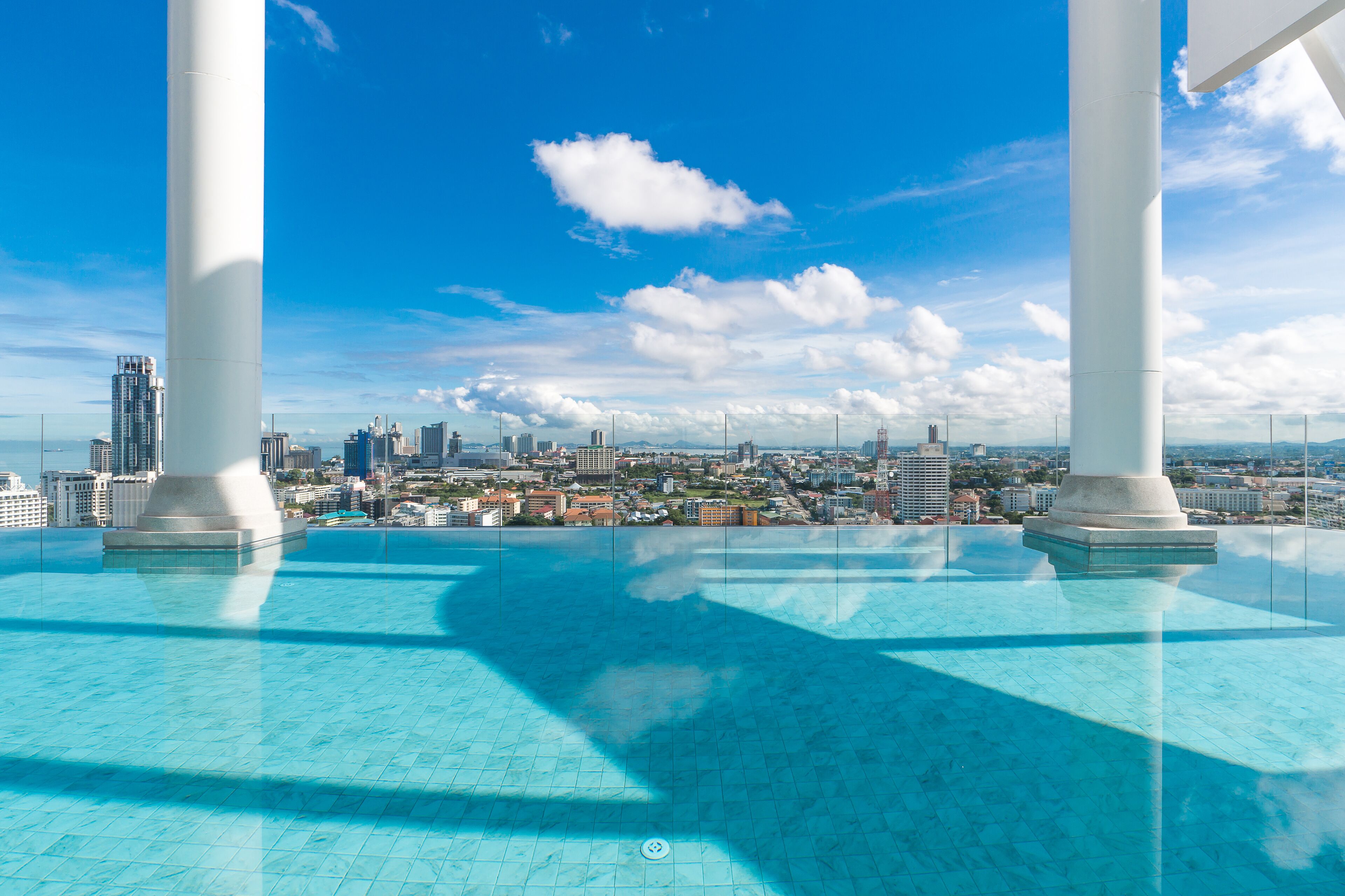 outdoor pool, open 7:00 am to 9:00 pm, pool umbrellas, pool loungers