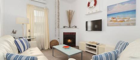 TV connectée, cheminée, lecteur de DVD