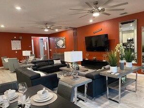 Smart TV, video games, foosball, music library