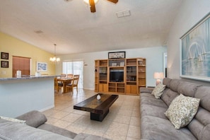 House, 4 Bedrooms | Living room | TV - Indian Ridge- 4 Bedroom Pool Home- 2405IR 4 Home by RedAwning (Kissimmee)