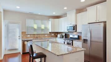 Townhome, 4 Bedrooms | Private kitchen | Fridge, oven, coffee/tea maker
