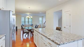 Townhome, 4 Bedrooms | Private kitchen | Fridge, oven, coffee/tea maker