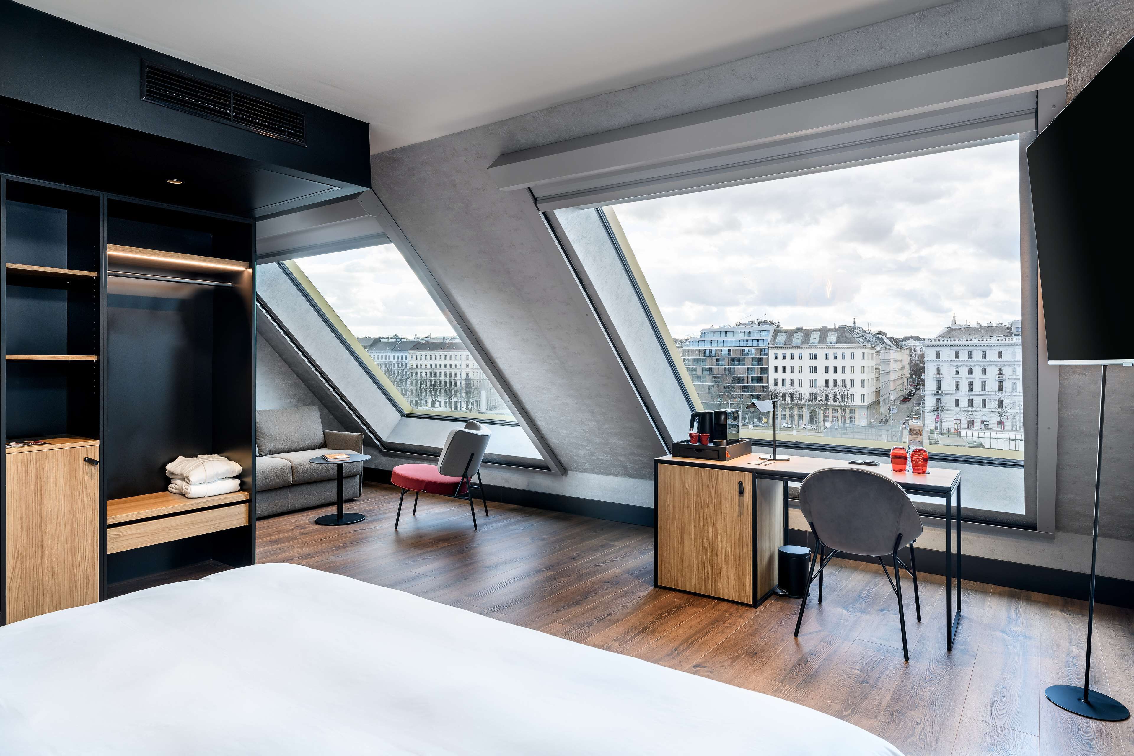 junior suite | 1 bedroom, in-room safe, desk, laptop workspace