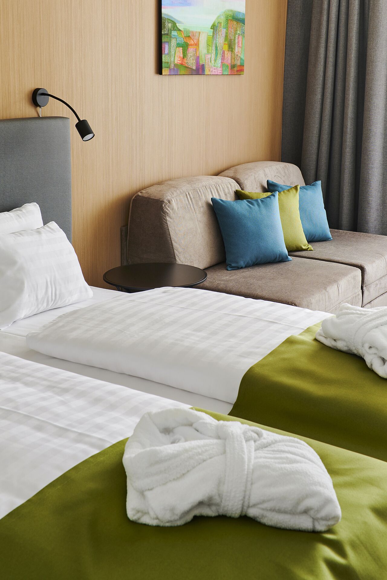 premium bedding, pillow-top beds, desk, blackout curtains