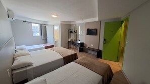 Comfort Quadruple Room | Individually furnished, desk, laptop workspace, soundproofing - Hotel Prime Inn (Campinas)