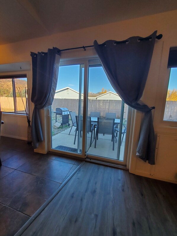 Enjoy al fresco dining on the patio with a barbecue grill and outdoor seating.