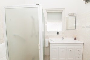 Shower, free toiletries, hair dryer, towels