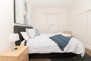 2 bedrooms, iron/ironing board, travel crib, internet