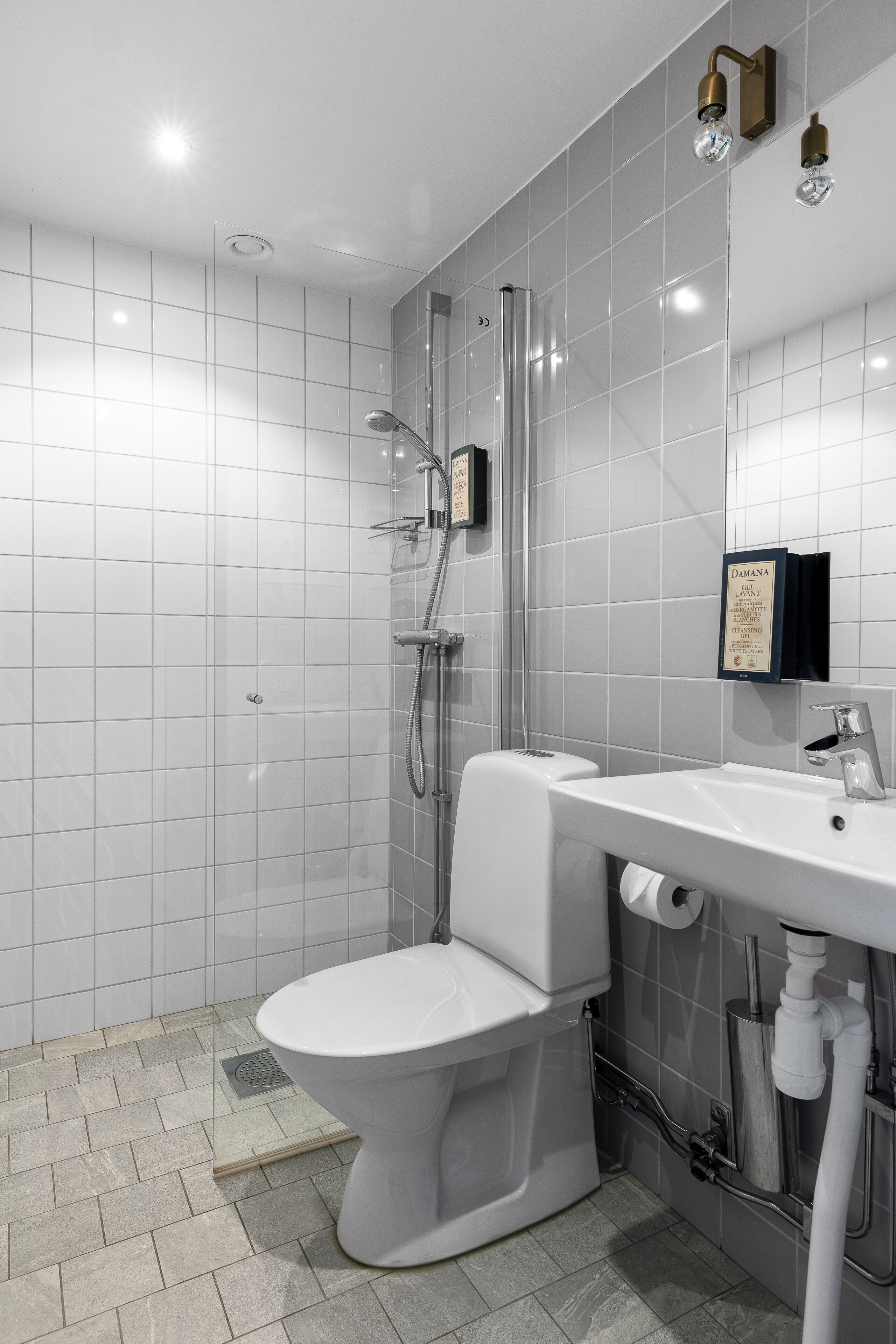 comfort studio | bathroom | shower, hair dryer, heated floors, towels