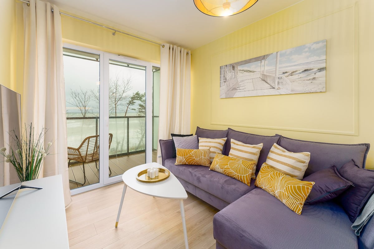 Deluxe-Apartment | Wohnbereich | Flachbildfernseher