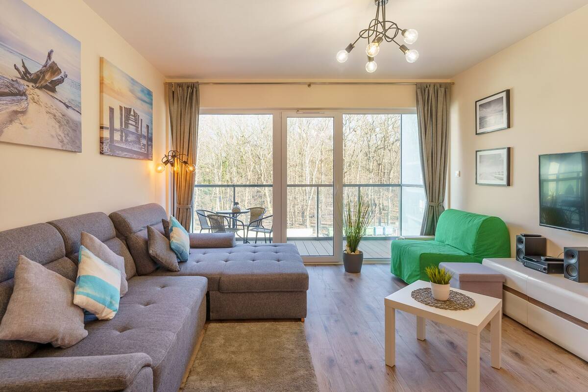 Deluxe-Studiosuite | Wohnbereich | Flachbildfernseher