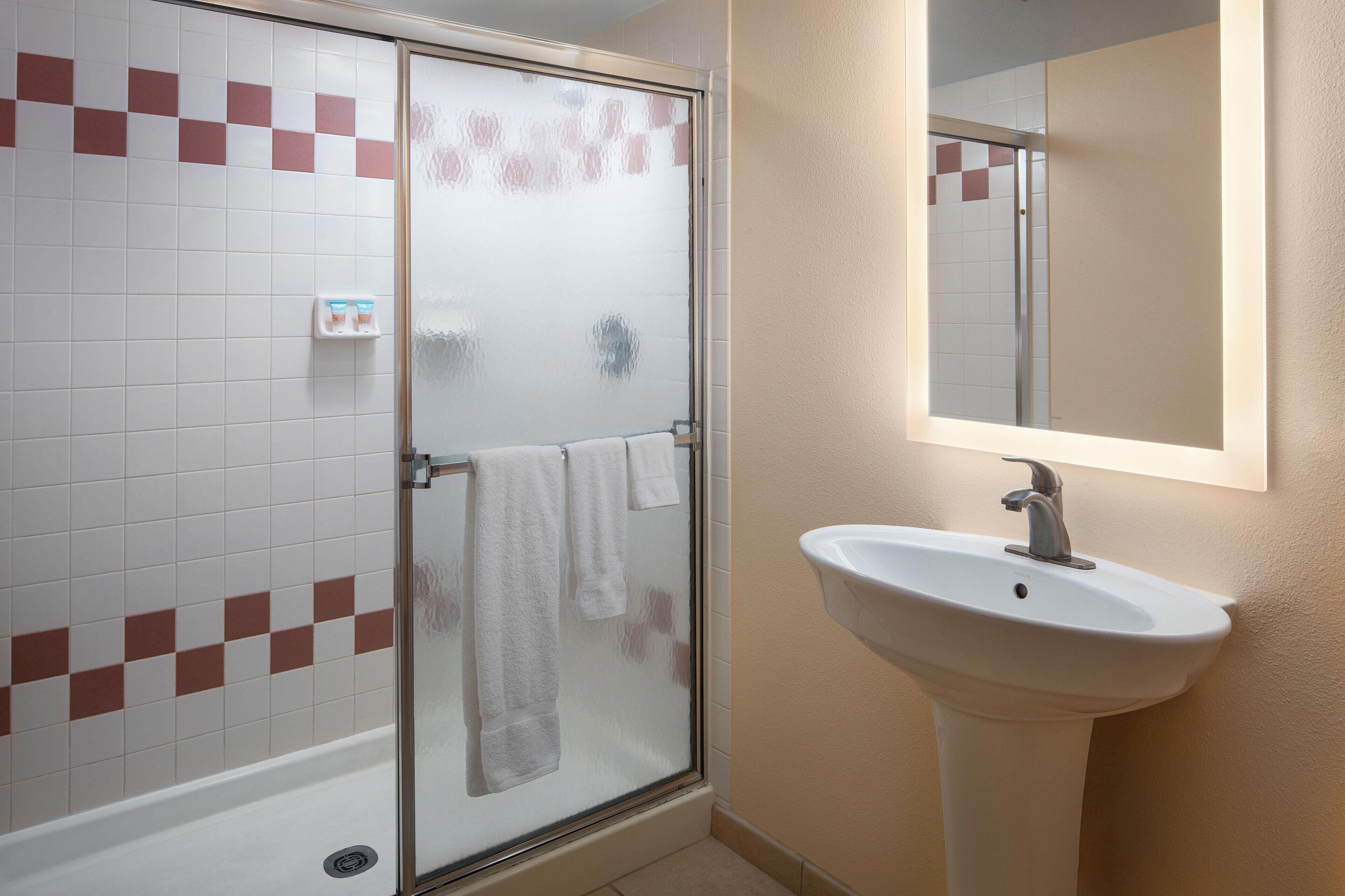 separate bathtub and shower, free toiletries, hair dryer, towels