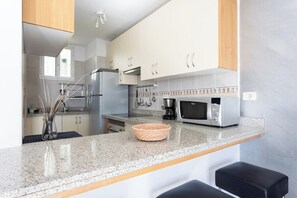 Microwave, oven, stovetop, coffee/tea maker