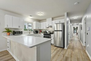 Fridge, microwave, oven, stovetop - `Oak Grove Bungalow`- Private Downtown Bungalow (Austin)