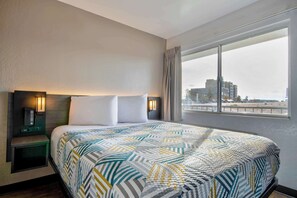 Desk, laptop workspace, blackout curtains, free WiFi