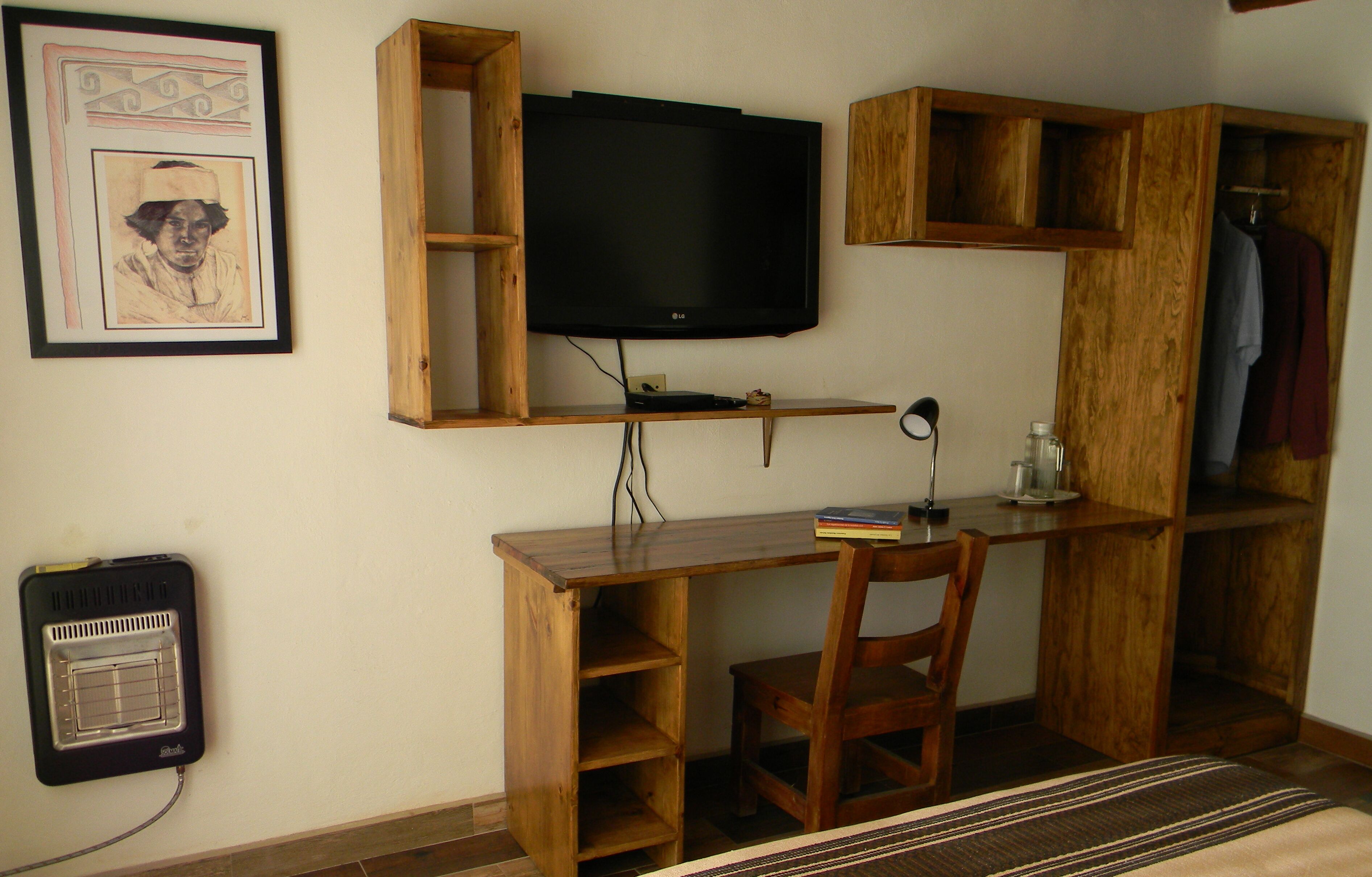 Hypo-allergenic bedding, down comforters, desk, laptop workspace