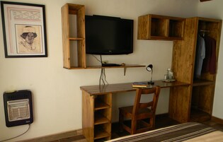 Hypo-allergenic bedding, down comforters, desk, laptop workspace