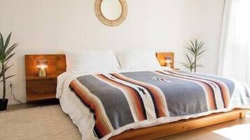 2 habitaciones, tabla de planchar con plancha, cuna de viaje y wifi