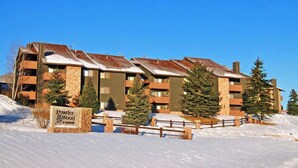 A multi-story building with a sign reading "Powder Wood."