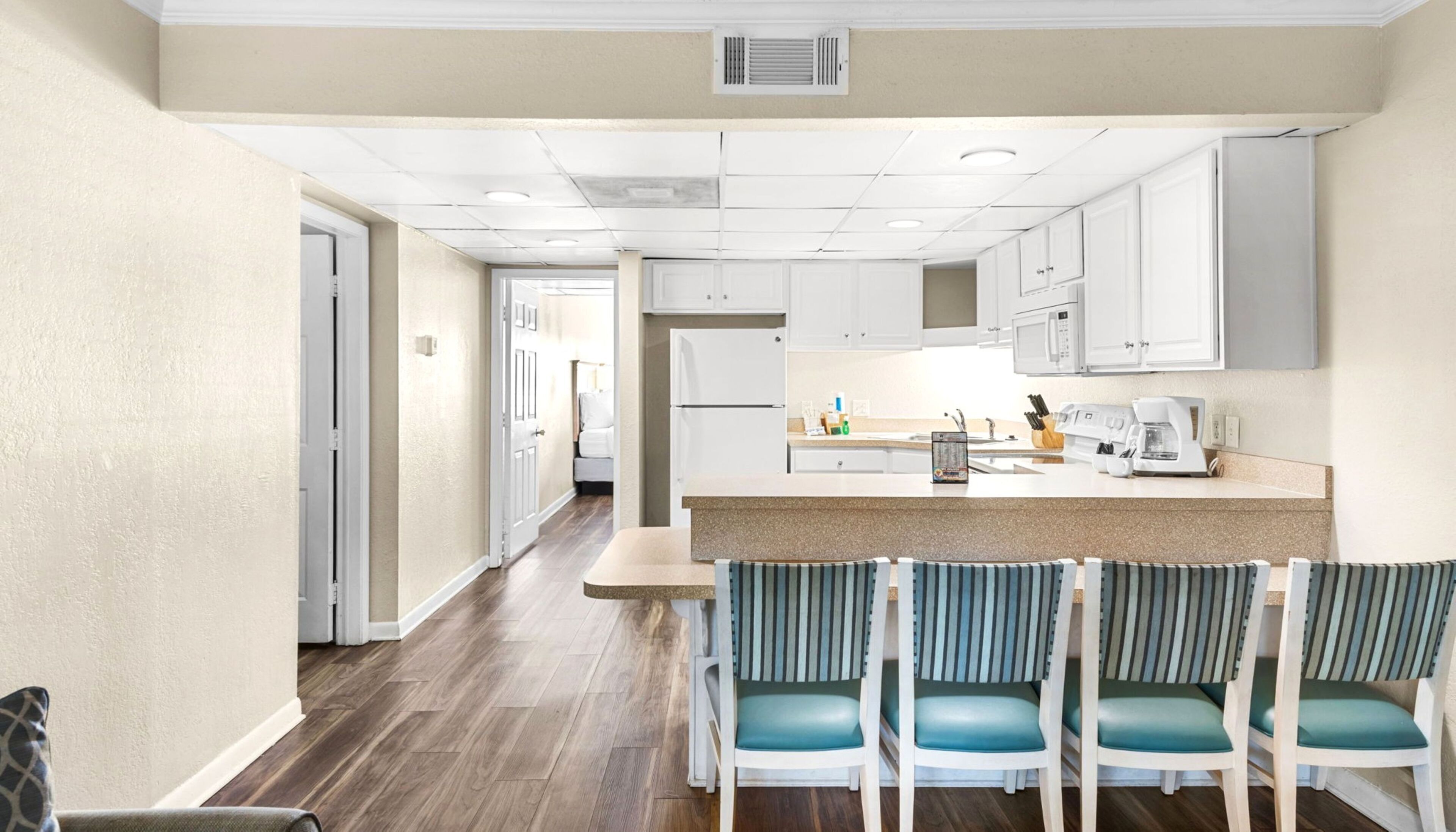 Family Condo, 2 Bedrooms | Private kitchen | Microwave, stovetop, dishwasher, coffee/tea maker