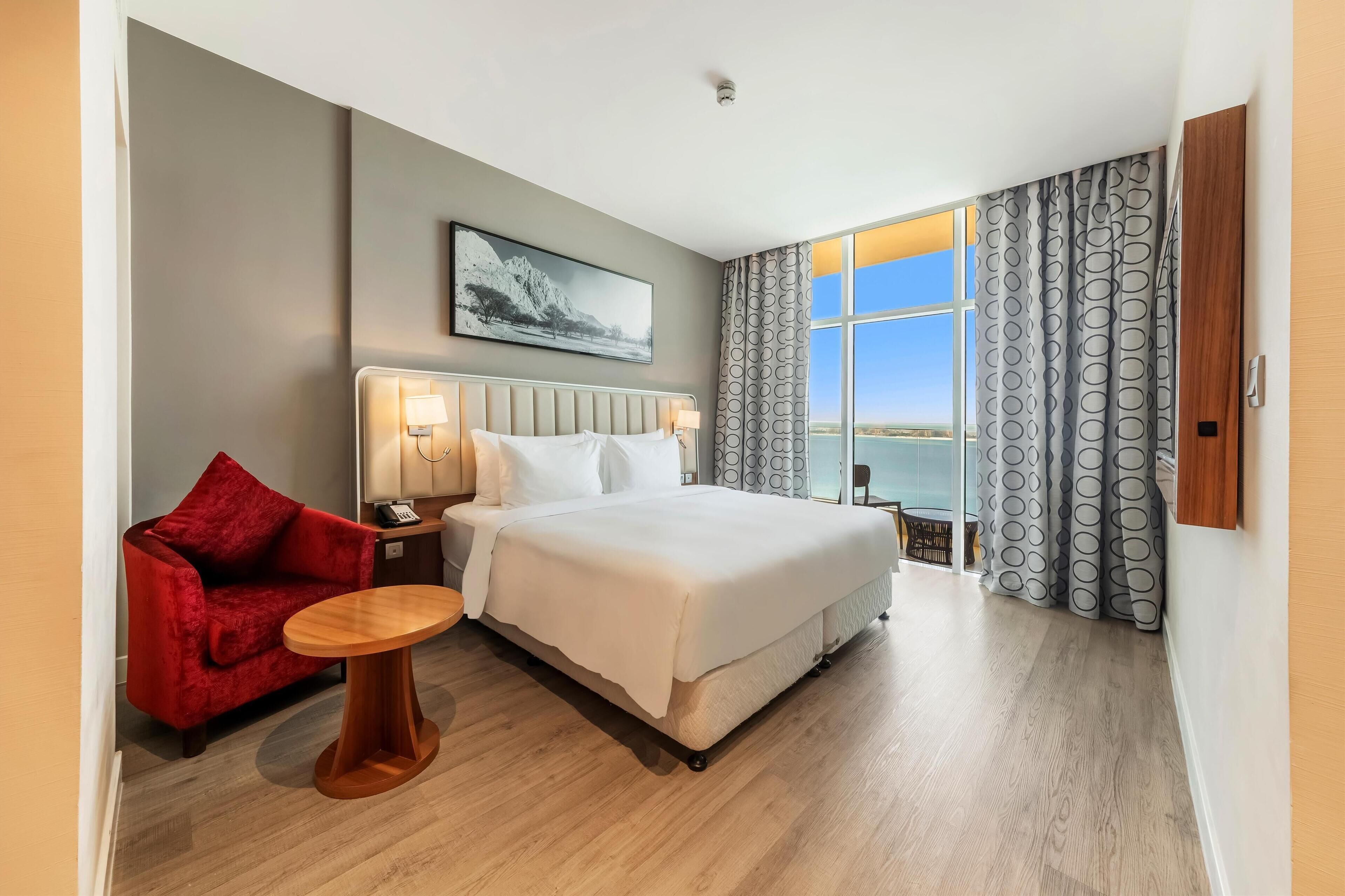 Suite, 1 Bedroom, Balcony, Sea View | Minibar, in-room safe, desk, soundproofing