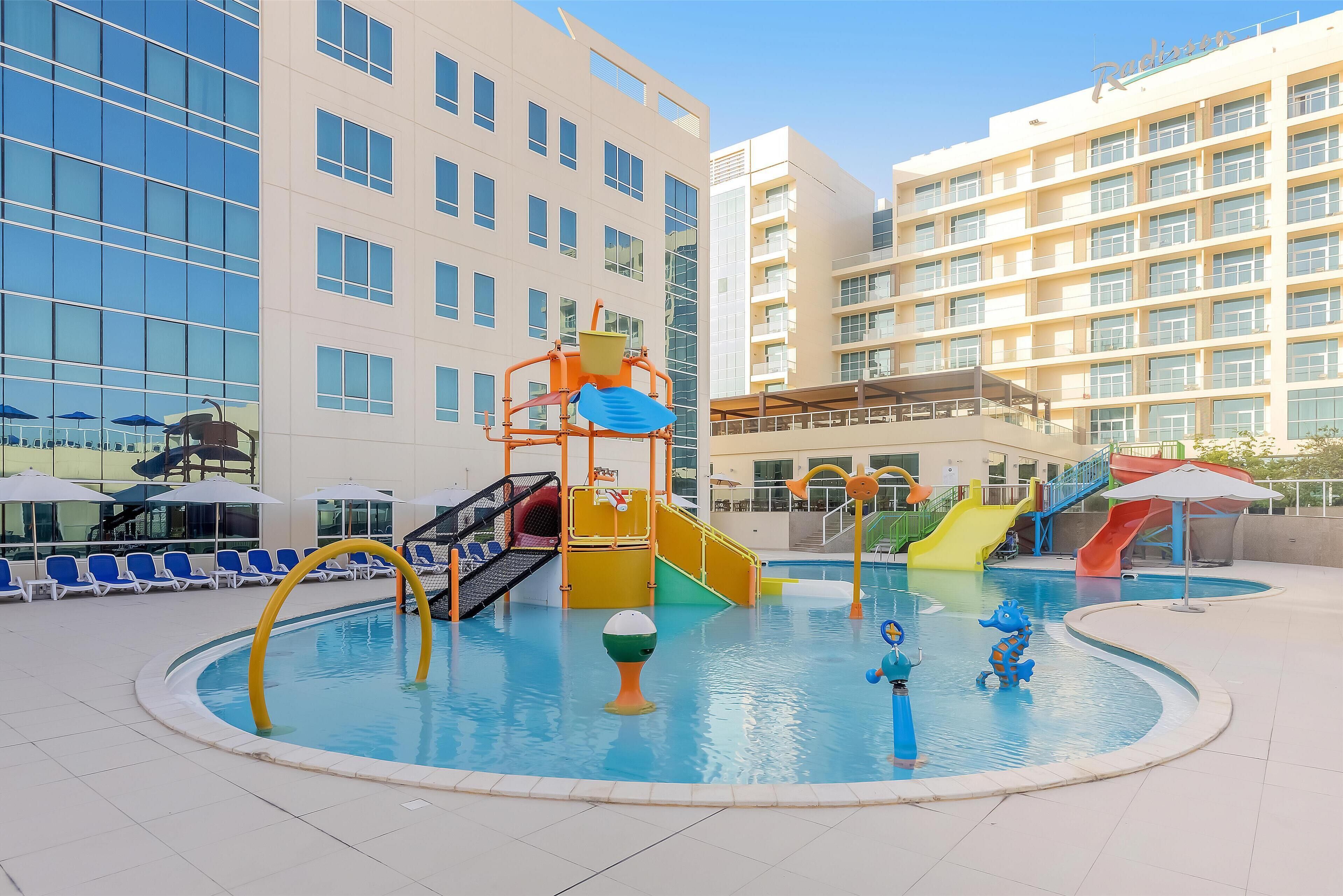 3 outdoor pools, open 9:00 AM to 6:00 PM, pool umbrellas, pool loungers