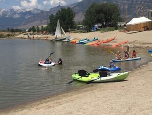 Enjoy kayaking and sailing on the lake from our lakeside beach.