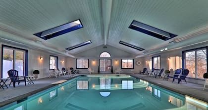 Ski-in/out condo with fireplace, hot tubs. pool, tennis & washer/dryer