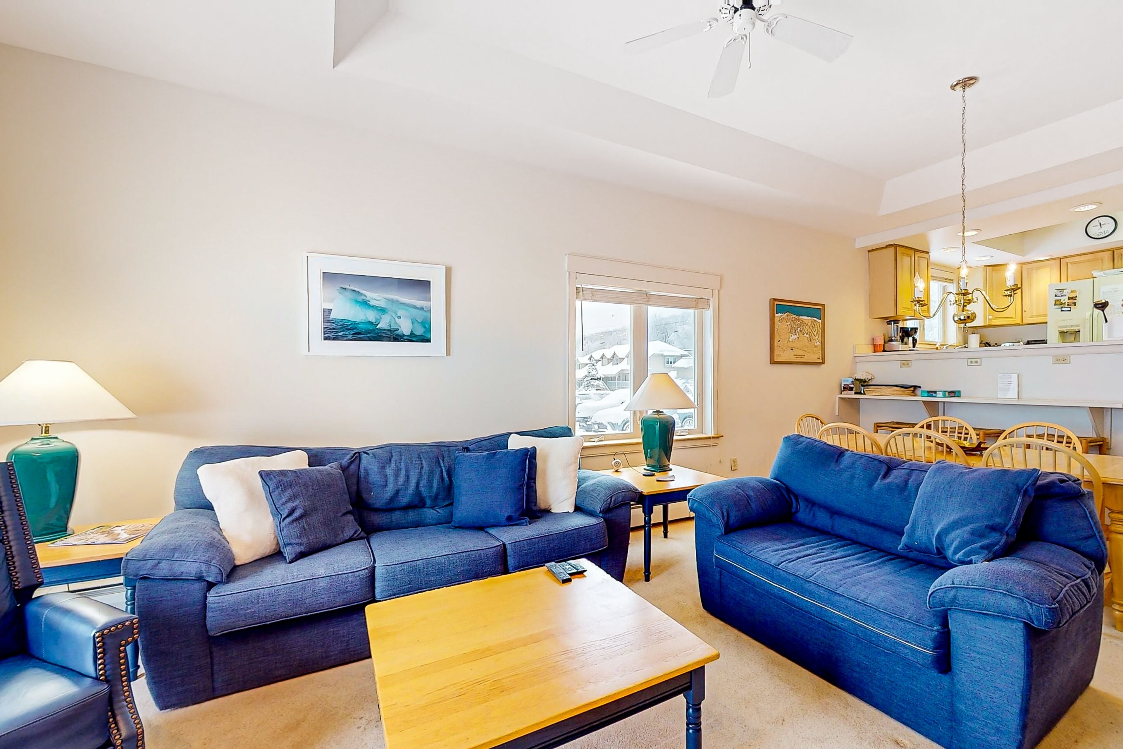 Ski-in/ski-out condo with pool, hot tub, sauna, mountain view, deck, & fireplace