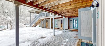 Ski-in/ski-out condo with pool, hot tub, sauna, mountain view, deck, & fireplace