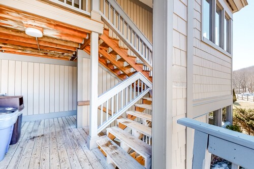 Ski-in/out condo with a fireplace, hot tub, gym, pool, washer/dryer & cable