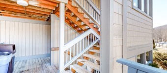 Ski-in/out condo with a fireplace, hot tub, gym, pool, washer/dryer & cable