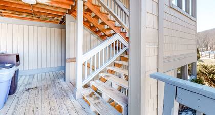 Ski-in/out condo with a fireplace, hot tub, gym, pool, washer/dryer & cable