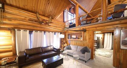 Come stay in this massive historic log mansion