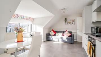 Apartamento, banheiro privativo | Lounge