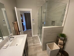 Bathtub, hair dryer, towels, soap