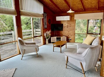 Lounge with comfy couch and chairs.  Smart TV, games and unlimited WiFi.