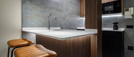 Microwave, oven, coffee/tea maker, cookware/dishes/utensils