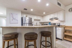 Condo, 2 Bedrooms | Private kitchen | Cookware/dishes/utensils - Florence II 202 by Padre Island Rentals (South Padre Island)